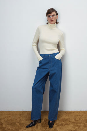 WOOL TURTLENECK TOP IN VANILLA