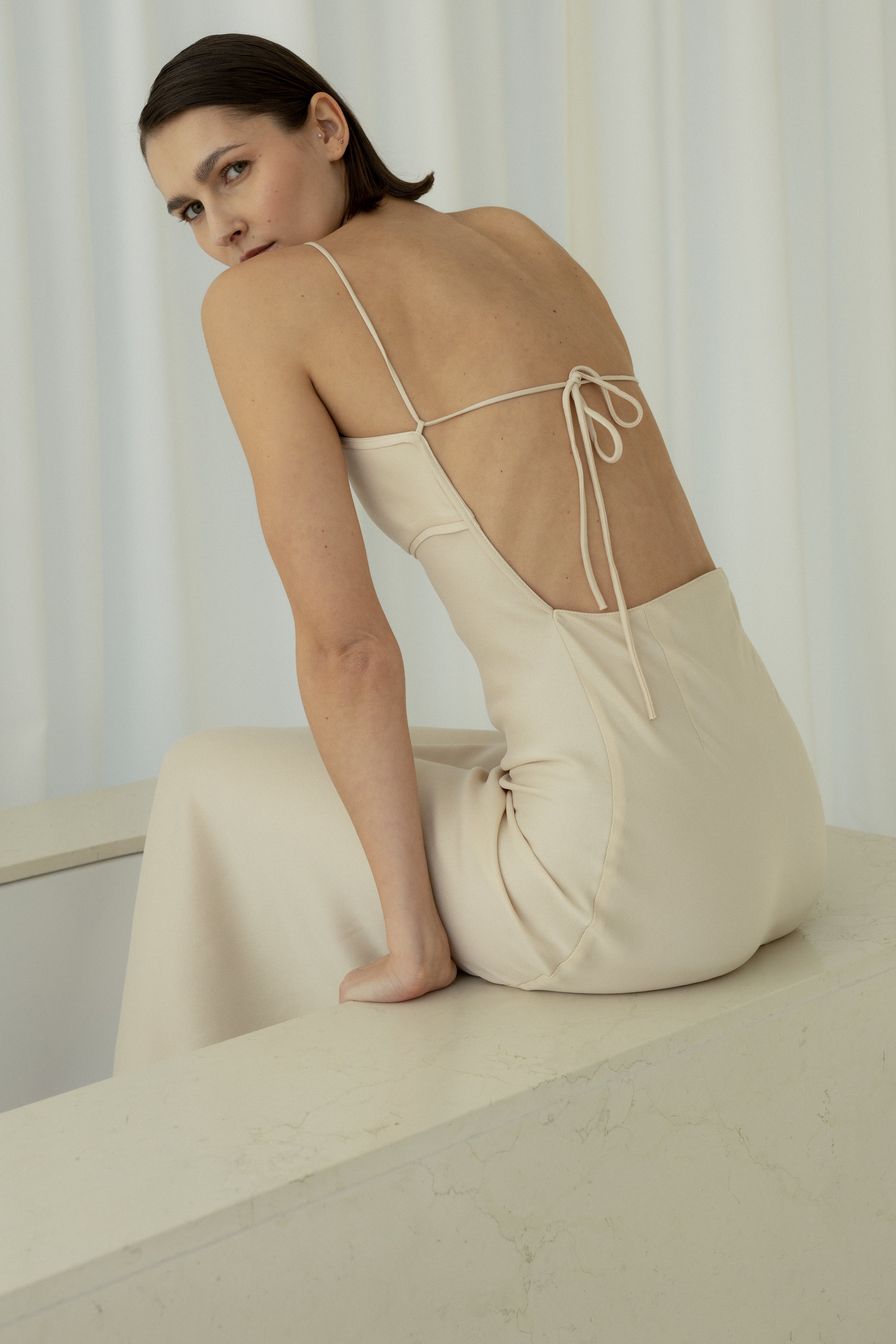 LONG BACKLESS SLIP DRESS IN CREAM